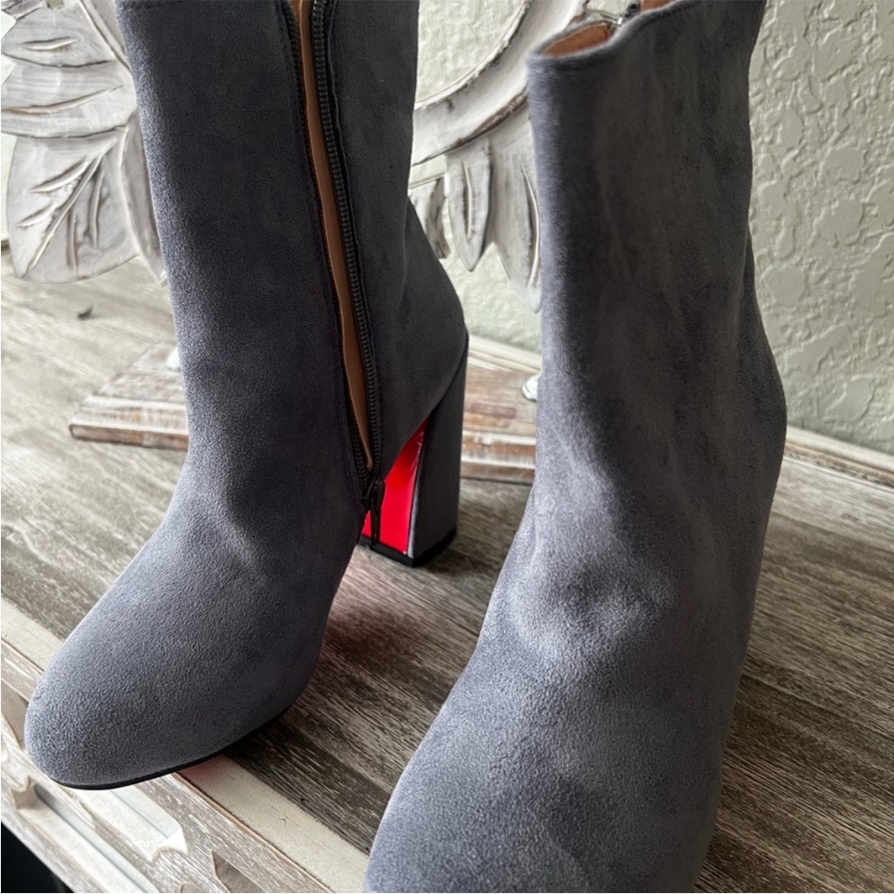CHRISTIAN L  Light blue side boots ( had to re list since they unsold) size 7
